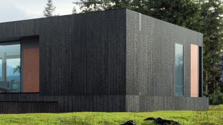 Shou Sugi Ban 70 m², vy över modulhusets vägg, träfasad.